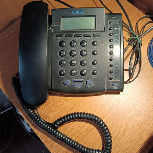 Protone black corded phone used, fully functional, 19x16 cm