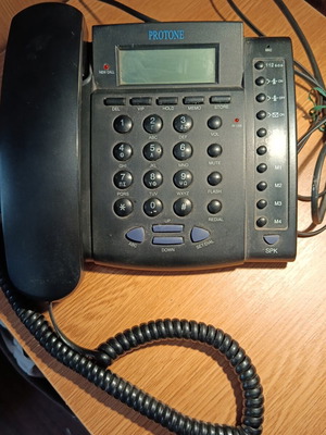 Protone black corded phone used, fully functional, 19x16 cm