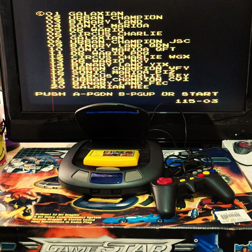 Retro 32-bit game console like new with accessories