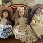 Set of 3 small porcelain dolls