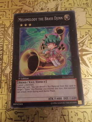 Melomelody The Brass Djinn κάρτα Yu-Gi-Oh! μεταχειρισμένη, Super Rare