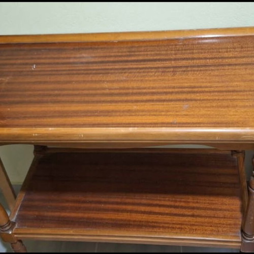 Wooden coffee table used with wheels