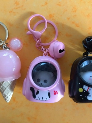 Illuminated keychains set of 3 like new, black and pink