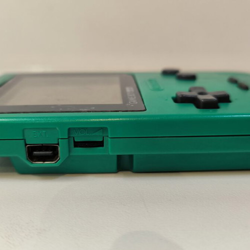 Game Boy Pocket Green console used with Test Drive 6 game