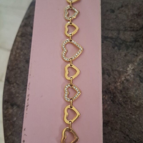 Bracelet new, gold color with heart design