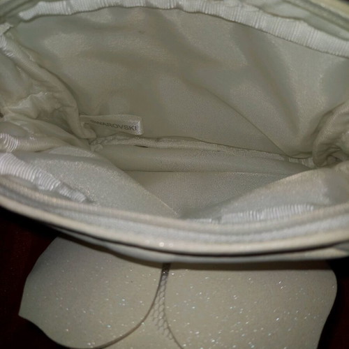 Swarovski and Clarins toiletry bags like new, set of 2 white
