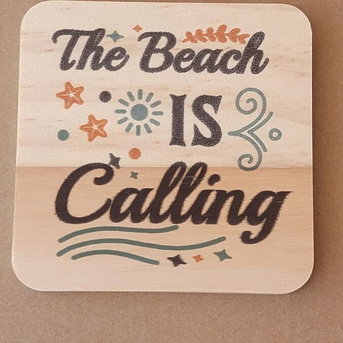Wooden summer coasters with seasonal designs