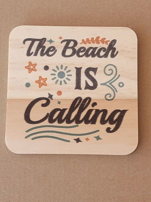 Wooden summer coasters with seasonal designs