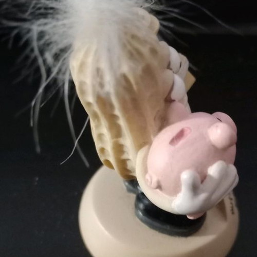 Desk decorative element used, figure with spring