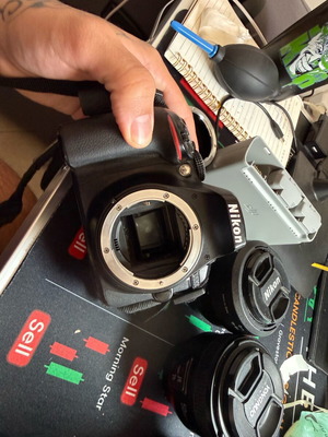 Nikon D5300 used with 4 lenses and 2 batteries charger