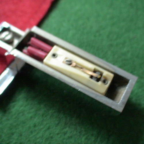 Record player tonearm with head shell and cartridge used, unknown type