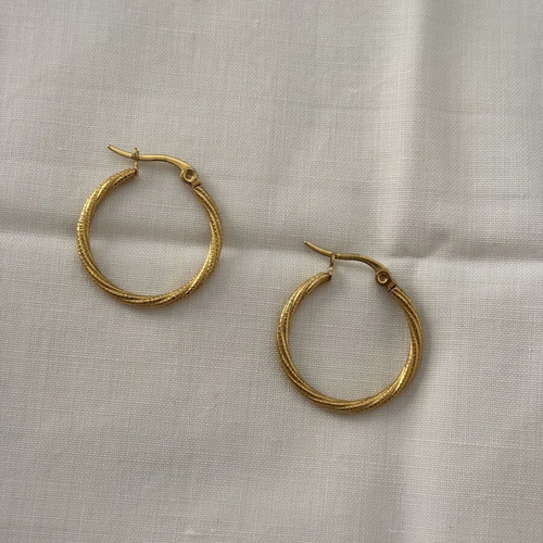 Iron golden rings with a twisted design.