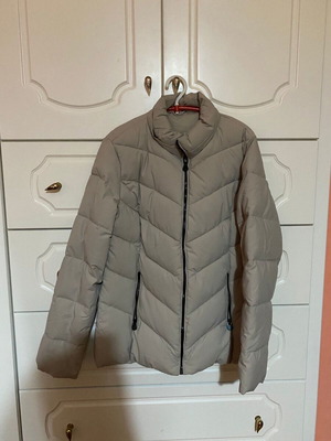 Beige women's teen jacket, size Medium, with black zippers