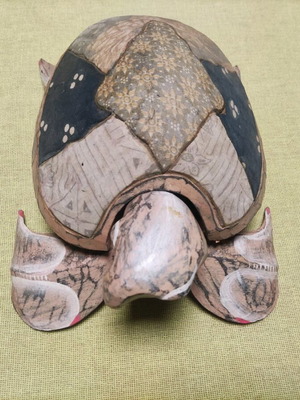 Handmade wooden turtle usable as ashtray