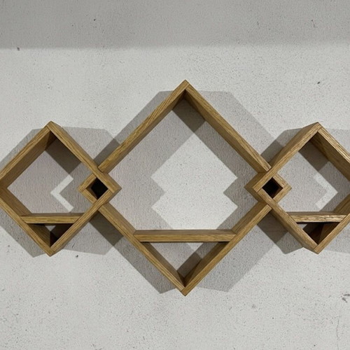 Handmade wall decor made of pine wood in oak shade
