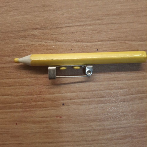 Yellow pin brooch