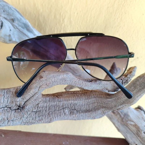 Vintage 90s Magnum sunglasses, one broken lens