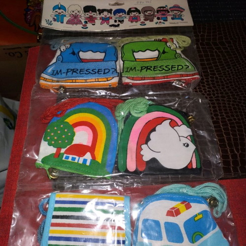 Fabric wallets new with buttons, cord, and zipper