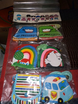 Fabric wallets new with buttons, cord, and zipper