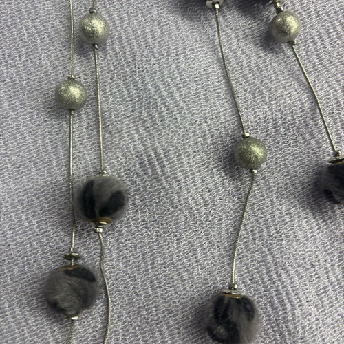 Long necklace with fuzzy balls like new