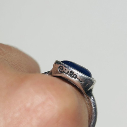 Silver ring with dark blue agate stone