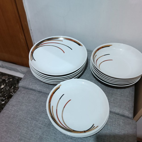 Porcelain plates set with 6 dinner, 6 soup, and 11 fruit plates