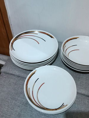 Porcelain plates set with 6 dinner, 6 soup, and 11 fruit plates
