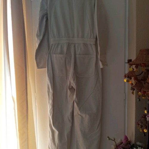 Beige denim jumpsuit like new with pockets and zipper
