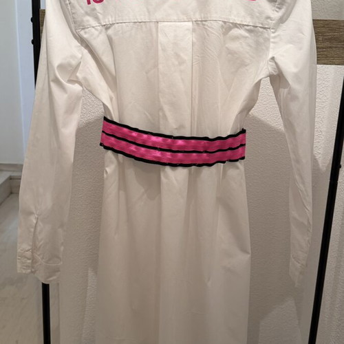 Set of 3 pieces like new, white semize shirt with letters, green skirt, fuchsia belt