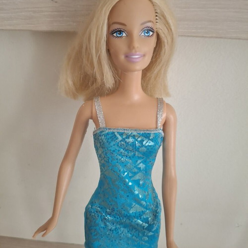 Barbie doll with blue dress like new