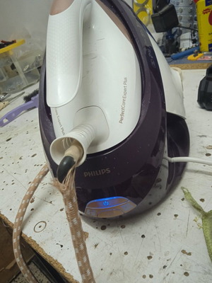 Philips PerfectCare Expert Plus iron used with minor wear