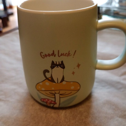 Mug with cat in good condition