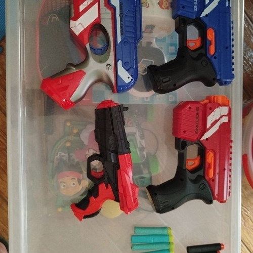 Toy guns and darts set