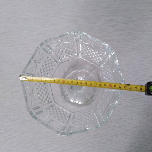 Vintage glass fruit bowl on foot with embossed diamond design