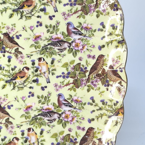 Porcelain serving platter decorated with birds and flowers like new