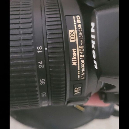 Nikon D90 with 18-105mm lens like new