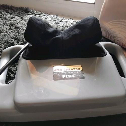 Shiatsu massager for neck and shoulders used
