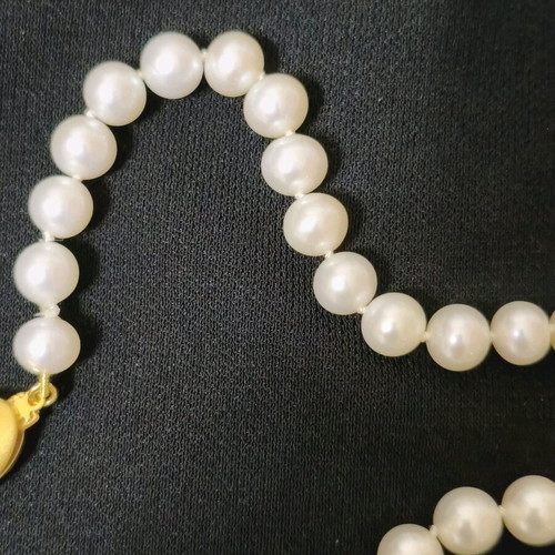 Pearl necklace new with 14K gold clasp