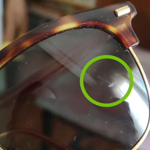 Tortoise sunglasses used, brown and gold with scratched lens