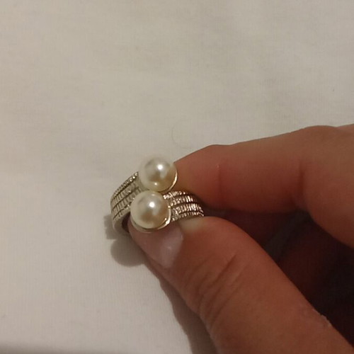 Metal ring with plastic pearls like new, gold color