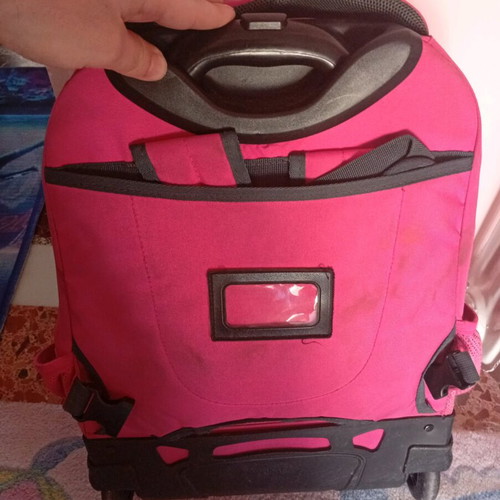 Polo Glow Girl school trolley bag used, fuchsia color