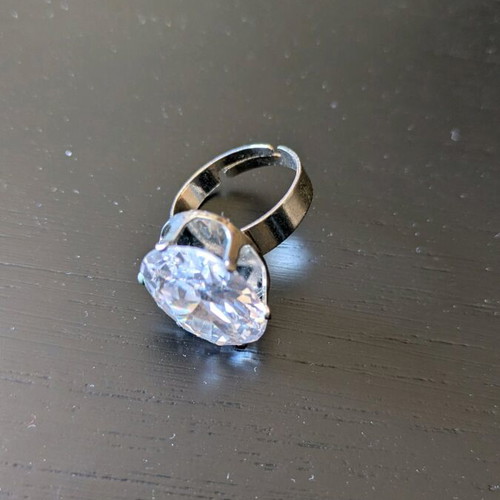 Silver ring like new with white transparent stone and adjustable size
