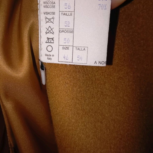 Coat new in camel color, size XL