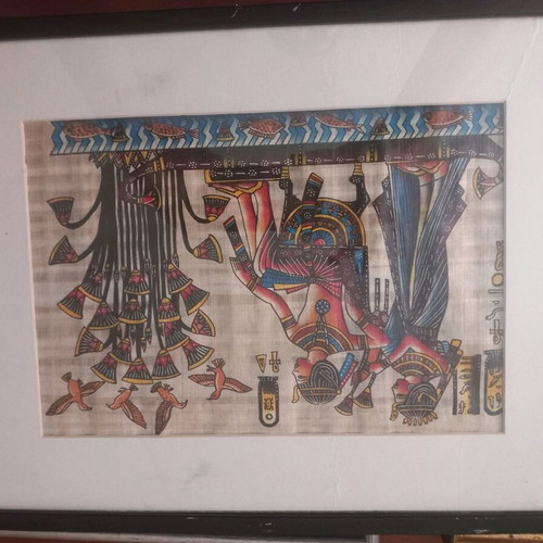 Egyptian papyri used in frame