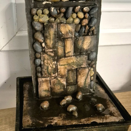 Decorative water fountain used with light