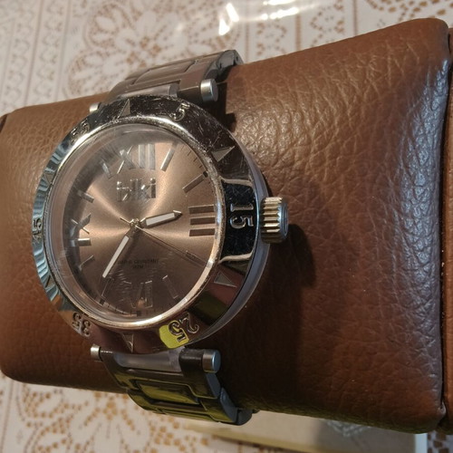 IKI Men's Quartz Watch with Brown Dial and Roman Numerals