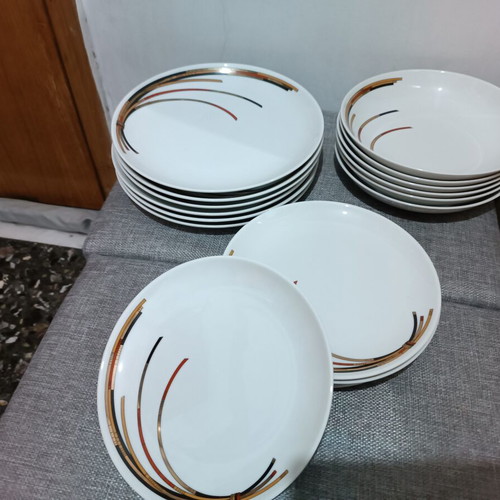 Porcelain plates set with 6 dinner, 6 soup, and 11 fruit plates