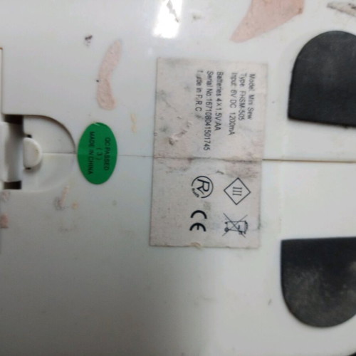 Mini sewing machine used for parts or decor, battery operated