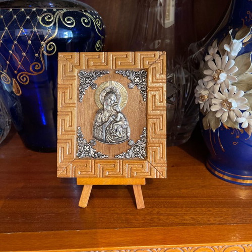 Vintage small wooden icon with silver details like new