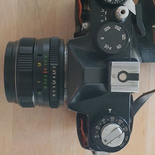 Zenith camera used with leather case